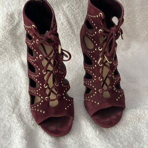 O
Worn once burgundy Sandal’s